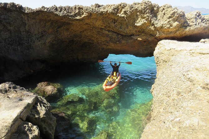 Alcudia: Guided Sea Kayaking & snorkelling Tour (day & sunset) - The sea cave moment: swimming in and how the guides light it up