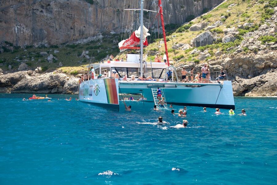 Alcudia: Sunset Catamaran Tour with Dinner and Snorkeling - Onboard Vibe: Views, Music, and a Family-Friendly Feel