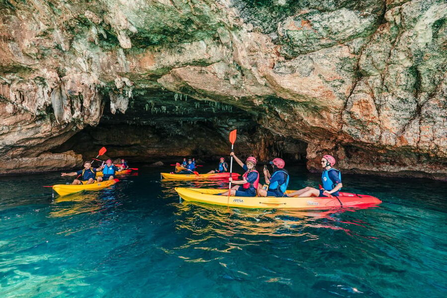 Cala Varques: Guided Sea Caves Kayak & Snorkeling Expedition - Sea caves and rock arches: what Cova des Coloms and pirate caves mean in practice