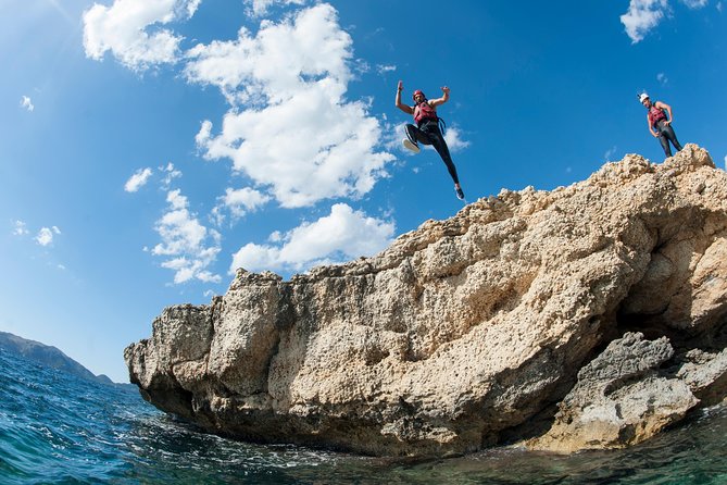 East Mallorca Coasteering Experience with Transfers - Gear Up: Wetsuit, Helmet, Buoyancy Aid, and Shoes