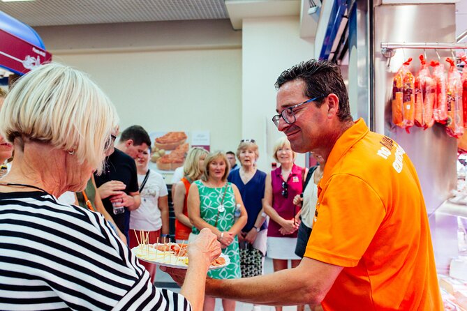 Food Tasting Walking Tour in Palma with a Local - Stop 5: Mercat de l’Olivar, seasonal tapas, and local wine at the table