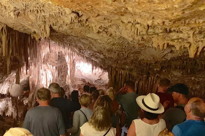 Guided Full-Day Tour of Drach Caves, Porto Cristo & Pearl Factory - Porto Cristo break: sea air, but plan your meal