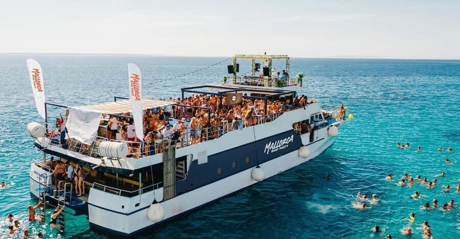 Mallorca: Boat Party with Live DJs, Lunch, & Nightclub Entry - CO2 Freeze Cannons and a Swim Stop in Palma’s Clear Water