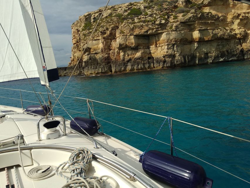Mallorca: Cala Vella Boat Tour with Swiming, Food, & Drinks - Stop 1 and cave country vibes: Cap Enderrocat or Punta Negra