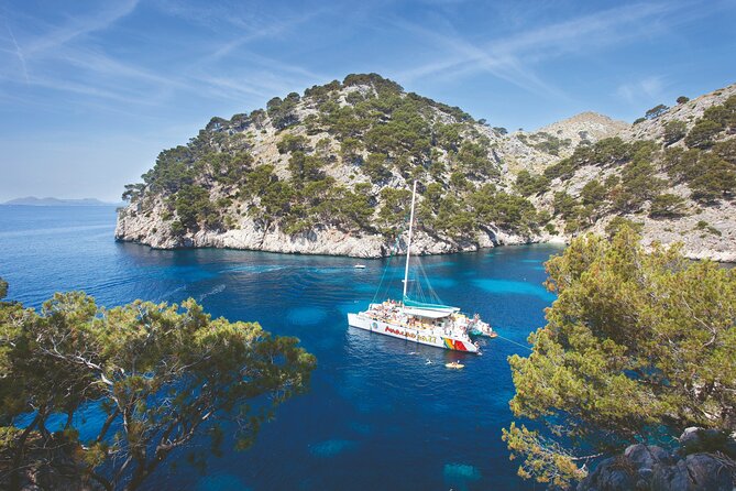 Mallorca Catamaran Cruise with Scenic Views and BBQ Lunch - Food and drinks at sea: BBQ value, plus what extras cost