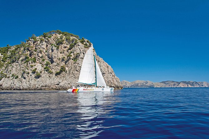 Mallorca Catamaran Cruise with Scenic Views and BBQ Lunch - Platja Des Coll Baix: a secluded cove pause that feels like a win