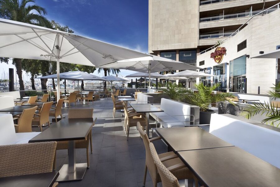 Mallorca: Hard Rock Cafe Entrance with Lunch or Dinner - The memorabilia walk: Beatles to U2 while you eat