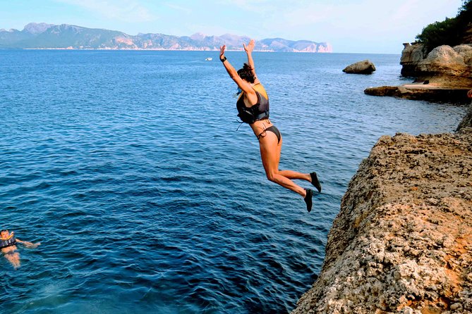 Mallorca: Kayaking, Sea Cave, Cliff Jumping & Snorkel Tour - Beach Picnic, Photos, and How to Leave With More Than Memories
