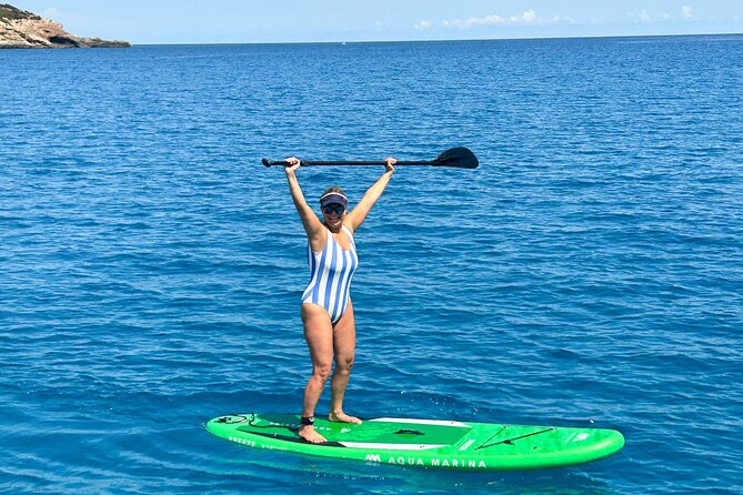 Mallorca Private Half-Day Sailing Experience with Tapas & Drinks - Cala Mayor: lively beach energy from onboard