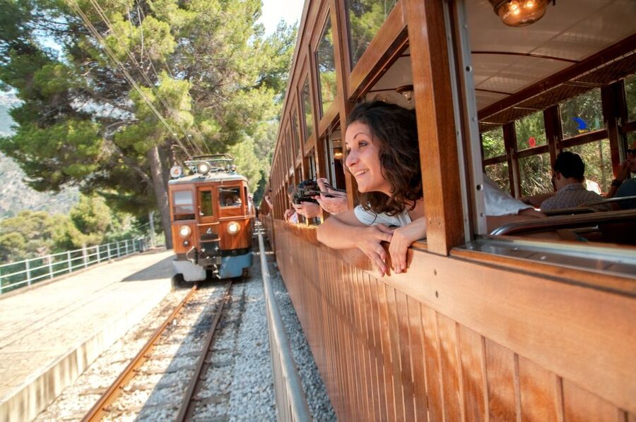 Mallorca: Scenic Full-Day Tour from the North - The 1912 wooden train through citrus and olive groves