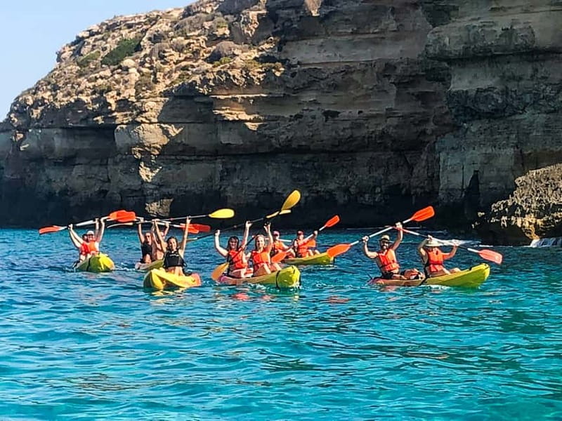Mallorca: Sea Cave Kayaking Tour with Snorkeling and a Snack - Swimming and snorkeling stops in turquoise water