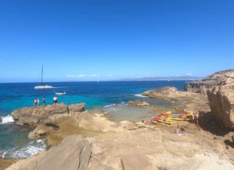 Mallorca: Sea Cave Kayaking Tour with Snorkeling and a Snack - The break and snack stop: ham and cheese or vegetarian, plus water