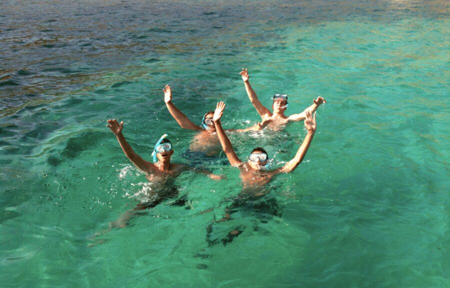 Mallorca : Speedboat, Snorkelling and Swimming Adventure - Speedboat Views: Lighthouse, Villas, and the White Sand Feel