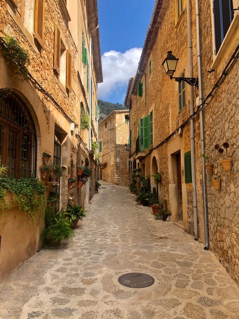 Mallorca: Valdemossa and Port of Soller Coca of Potato - Valldemossa in the Serra de Tramuntana: Cobblestones, Panoramas, and the Cartuja