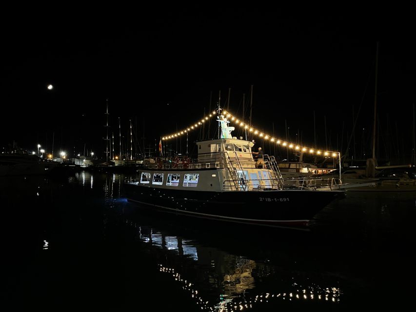 Palma de Mallorca: Bay of Palma Night Boat Cruise - The On-Board Vibe: Chill Music and One Included Drink