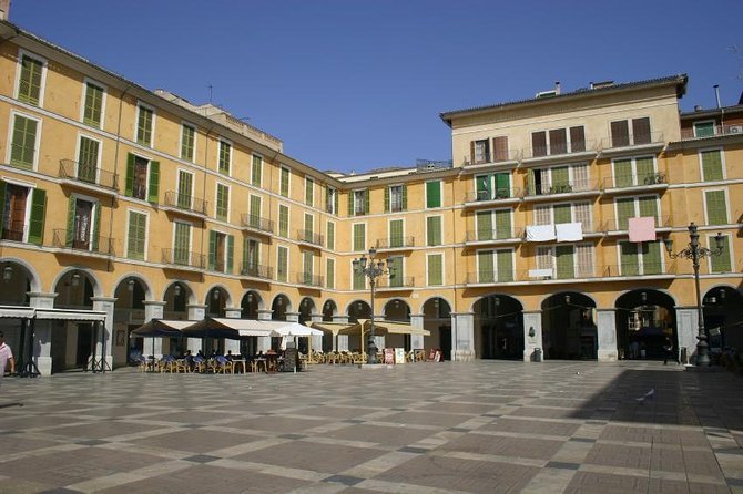 Palma de Mallorca Cultural and Foodie Tour - Historic city hall, fortress, and the square that ties it together
