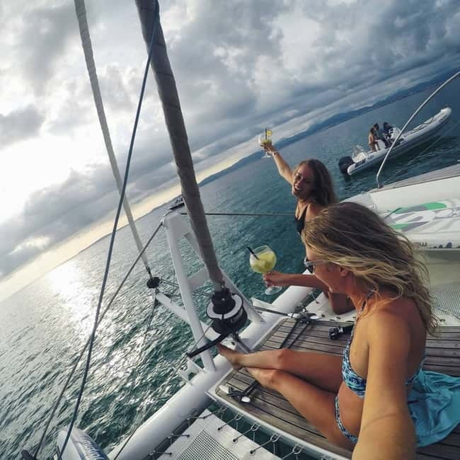 Palma de Mallorca: Deluxe Catamaran Sailing Tour with Meal - What you actually do onboard: swimming, snorkeling, SUP, and the bar
