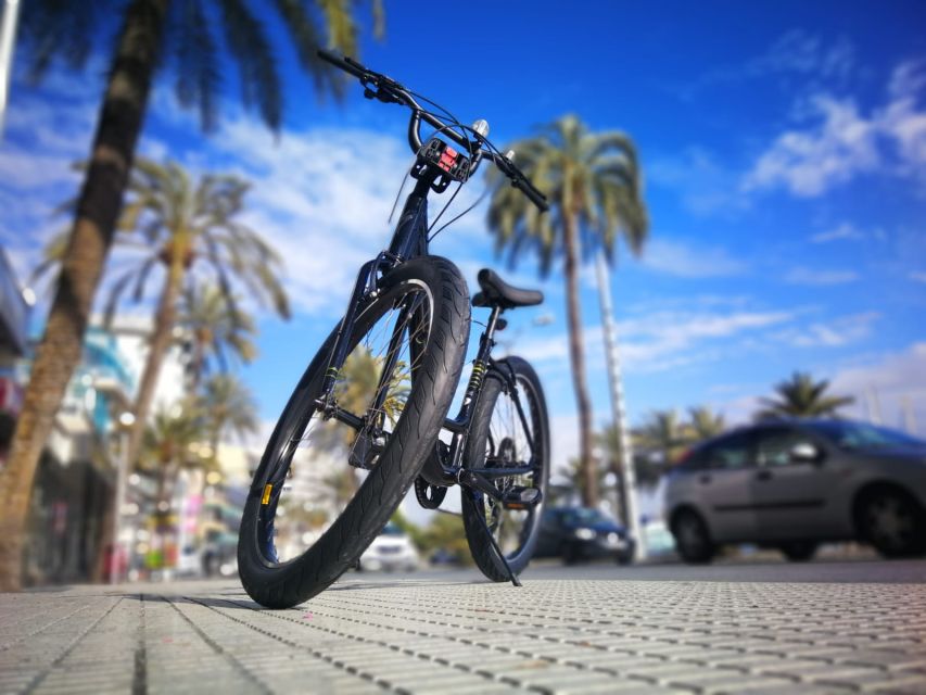 Palma de Mallorca: Guided Bicycle Tour with Tapas & a Drink - Old town weave: from narrow alleys to open plazas