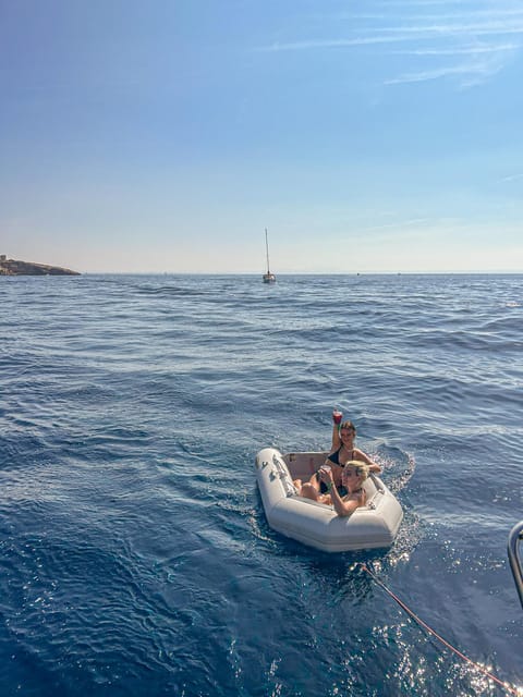 Palma de Mallorca: Sailing Boat Trip with Skipper & Tapas - The long secret stop: swimming, snorkeling, and lunch
