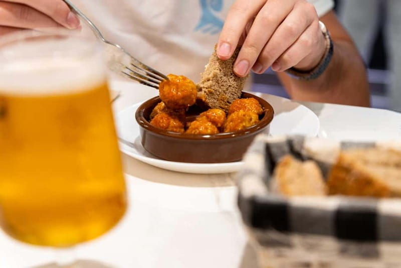 Palma de Mallorca: Traditional Mallorcan Food Tour - Stop 1 at Café Sa Caravana: llonquet for breakfast energy