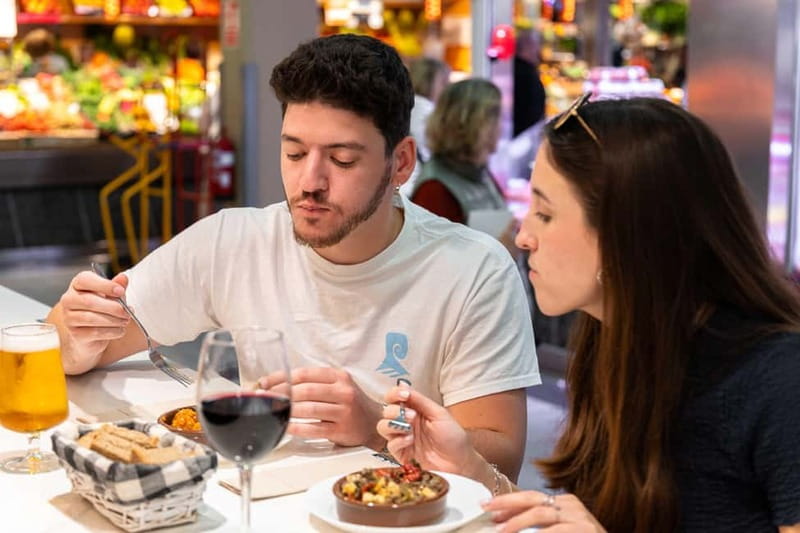 Palma de Mallorca: Traditional Mallorcan Food Tour - A short walk to Los Maños at Mercado del Olivar