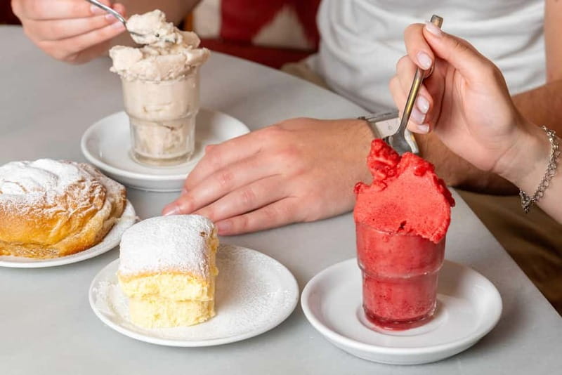 Palma de Mallorca: Traditional Mallorcan Food Tour - Stop 3 at Ca’n Joan de s’Aigo: ensaimada or coca with a cool finish