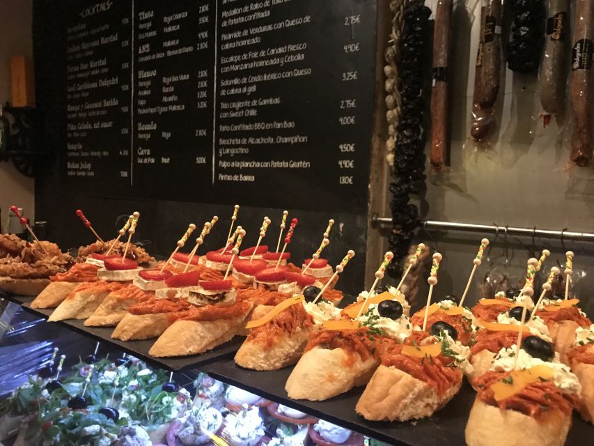 Palma Old Town Sunset Tour and Food Tastings - Plaça Major, the craft market, and the feeling of a town square that never shuts off