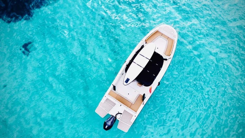Palma: Private Boat Tour in Mallorca with Snorkel and Paddle - Snorkeling where the sea goes clear, not just shallow