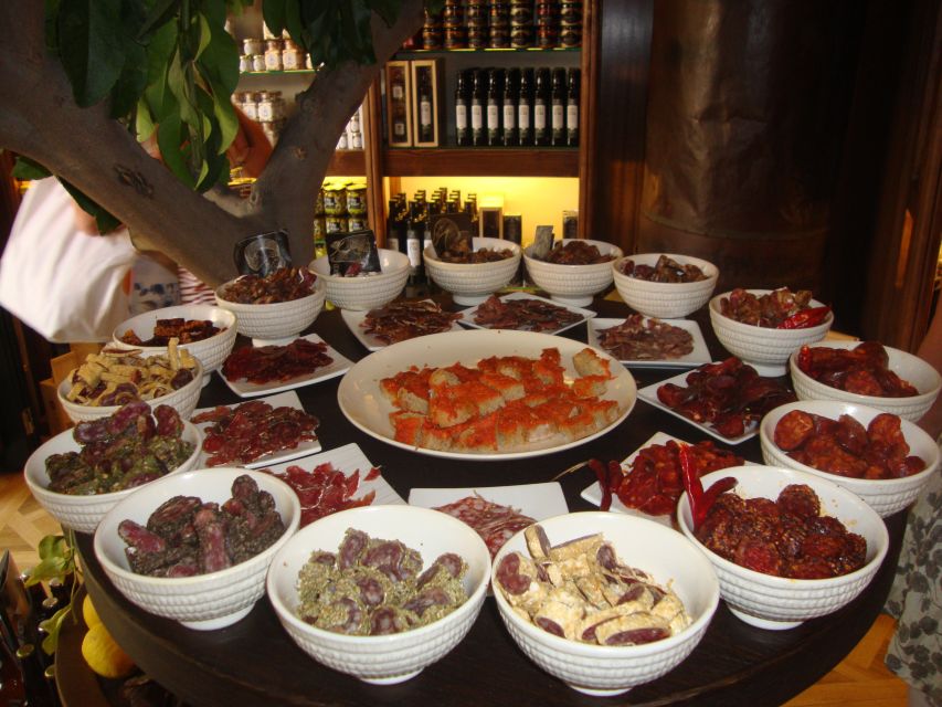 Palma Tour with Wine and Tapas Tasting - Tapas tasting plus a typical tapas bar finish: ham, cheese, and the local rhythm