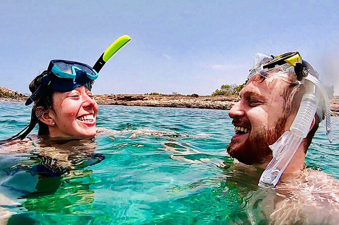 Private Boat Tour from Palma with Snorkeling and Paddle Surfing - Snorkeling coves in the Bay of Palma, plus the Green Cave-style stop