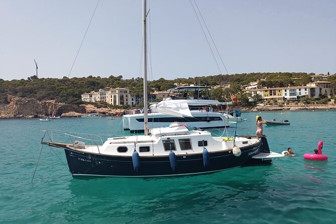 Sail boat day charter tour mallorca yacht llaut tradicional boat - The 2-3 Palma Bay stops, clear water, and a bit of history