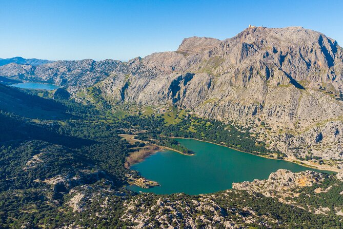 Scenic tour by Train, Tram and Boat through the lakes - Mallorca’s Serra de Tramuntana and the “water, road, sea” mix