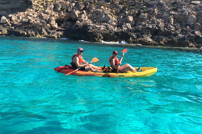Sea Caves Kayak Tour in Mallorca - Snorkeling in turquoise water, plus the sea cave swim