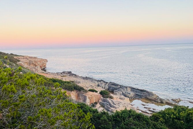 Self-guided Walking Tour and Outdoor Escape Game in Cala Millor, in German - The Punta de n’Amer stop: where the clues come alive